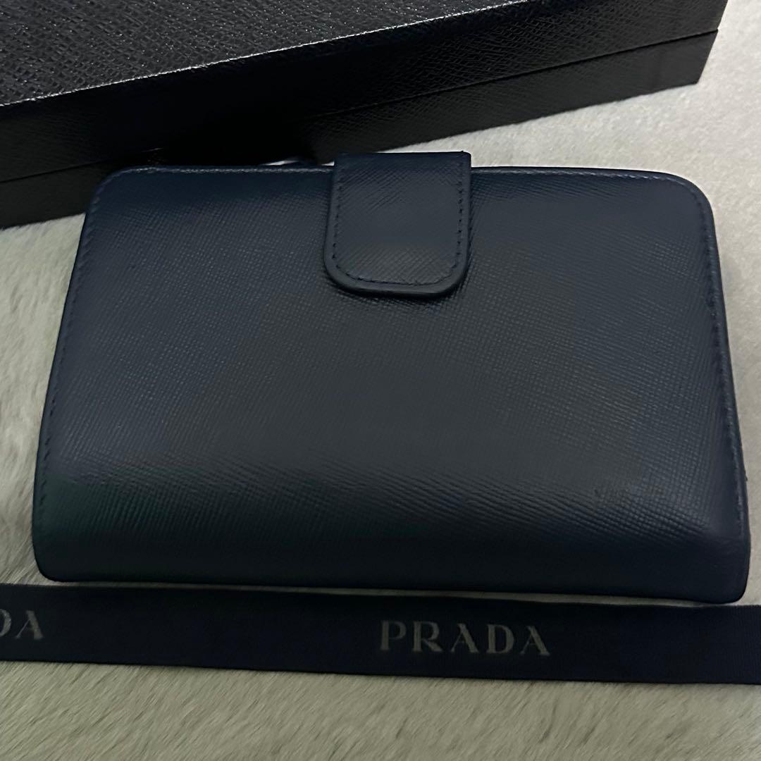 PRADA プラダ　折り財布　ラウンドファスナー　ブルー　ゴールドロゴ