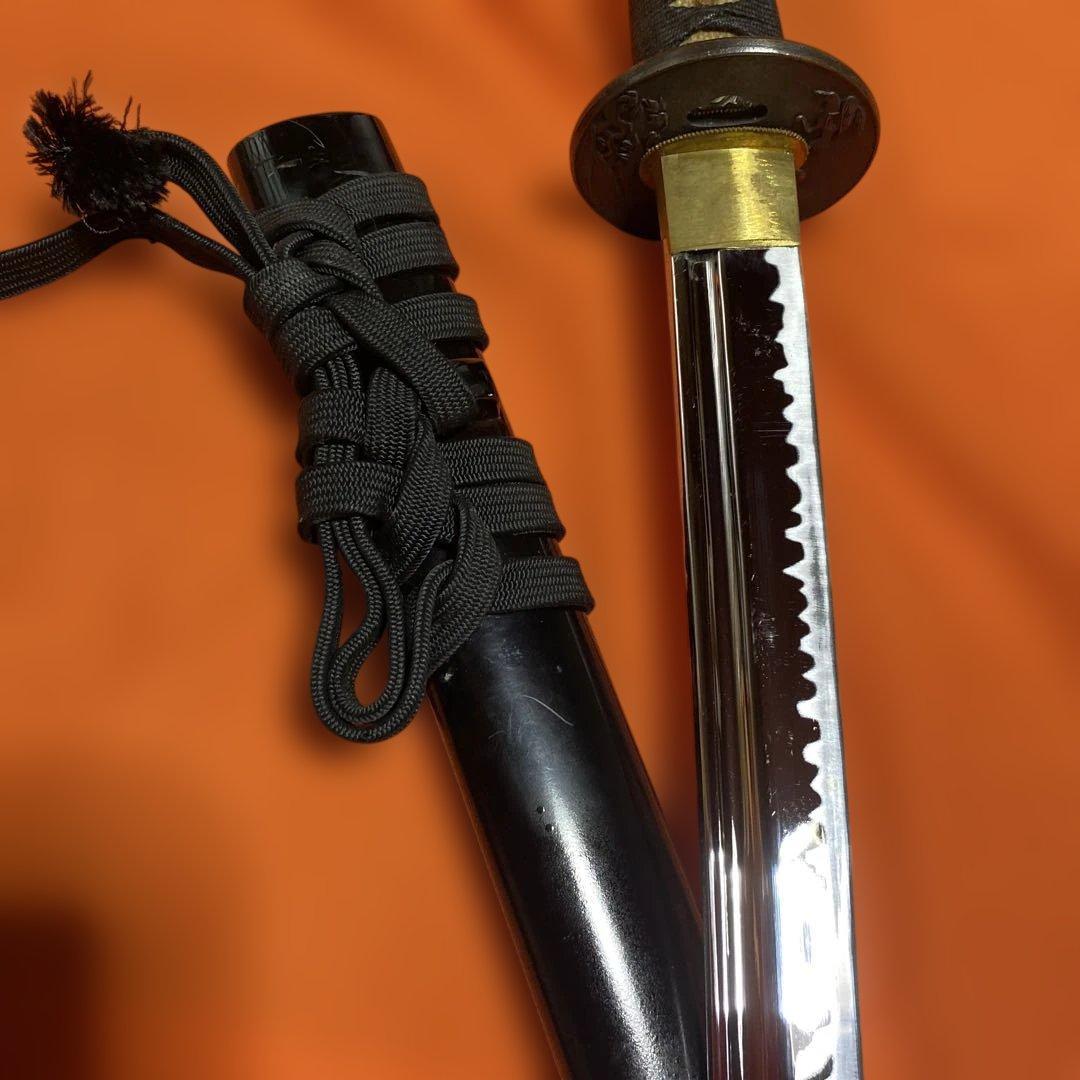 居合刀 黒柄 日出鳥木波図丸鍔 点炎黒呂鞘