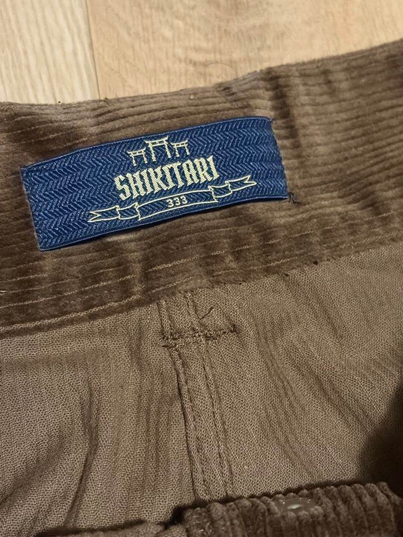 パンツ SHIKITARI WIDE FLARE CORDUROY PANTS