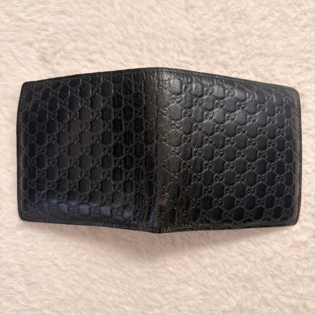 Gucci GGパターン 二つ折り財布 黒