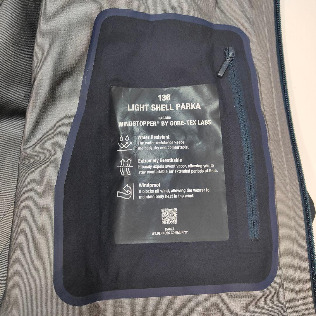 新品✨24年✨携帯袋✨ダイワライフスタイル ライトシェルパーカ L