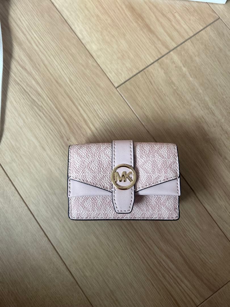 MICHAEL KORS ピンク GREENWICHフラップ トライフォールド