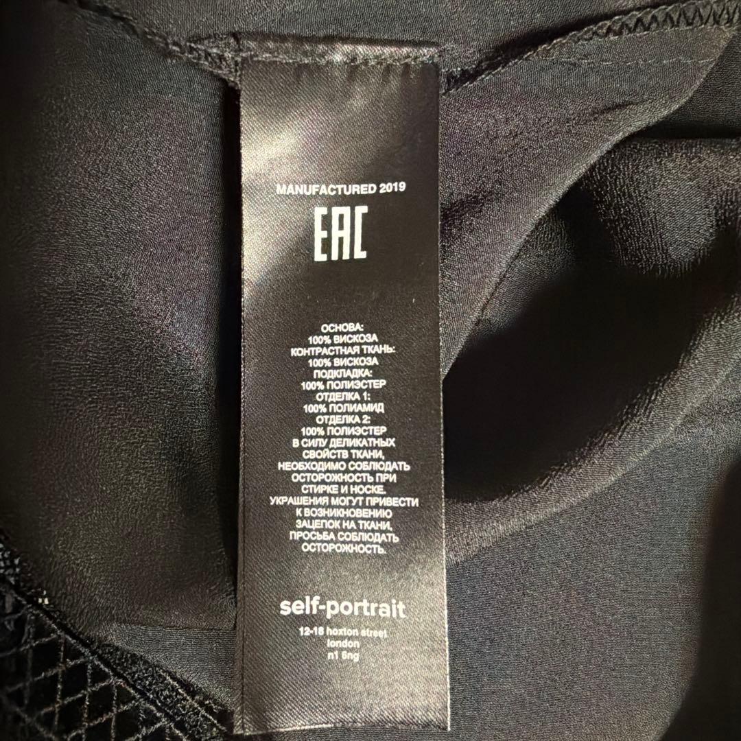 セルフポートレート　バックリボン花柄レース付きスリーブレスドレス