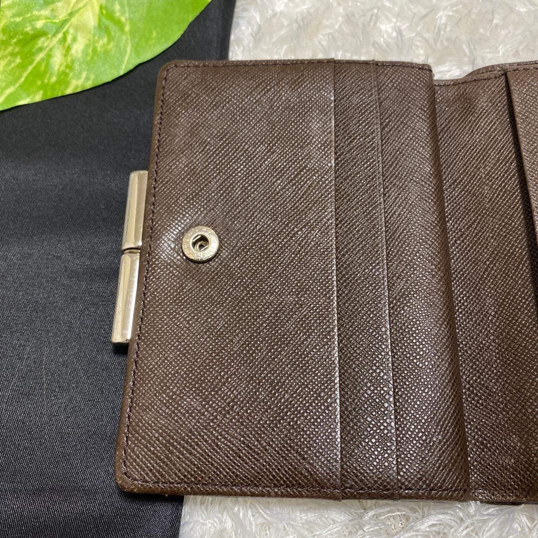 Burberry がま口　二つ折り財布　お洒落　美品　ノバチェック