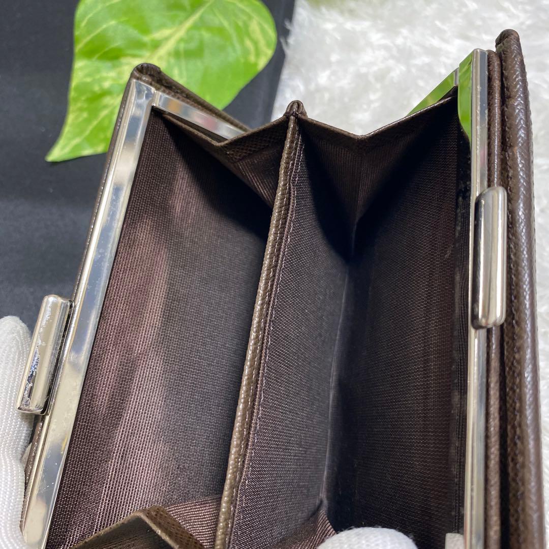 Burberry がま口　二つ折り財布　お洒落　美品　ノバチェック