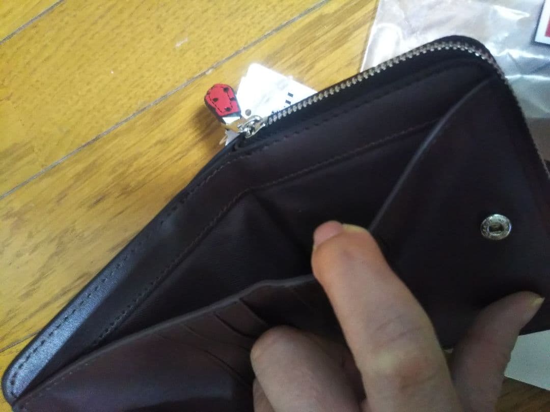 コーチいちご柄二つ折り財布コンパクト財布