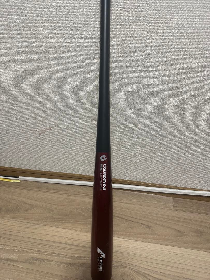 ディマリニ　コンポジットバット85cm 黒赤