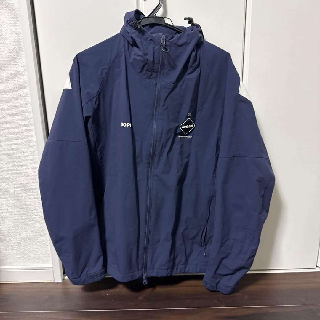 ジャケット・アウター F.C.R.B. BIG LOGO WARM UP JACKET Setup