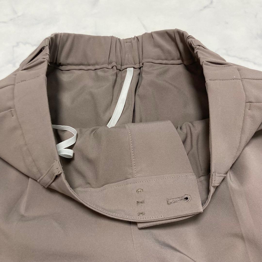 美品　インディヴィINDIVI ノーカラーパンツスーツ　ベージュ　ブラウン　38