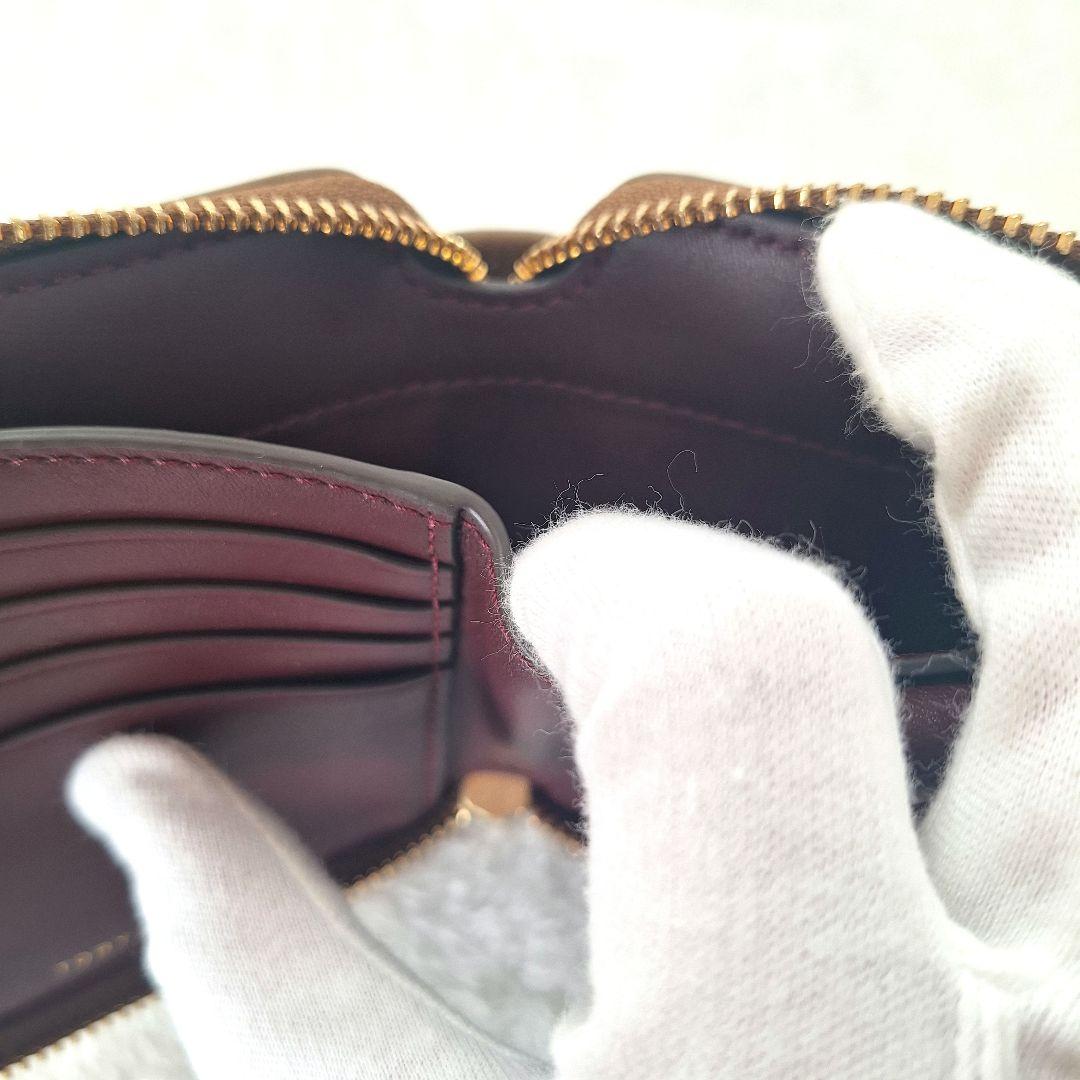 Tory Burch トリーバーチ 二つ折り財布 ロゴ 総柄 レザー ブラウン