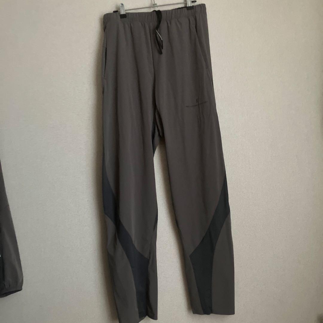 on x PAF トラックパンツ