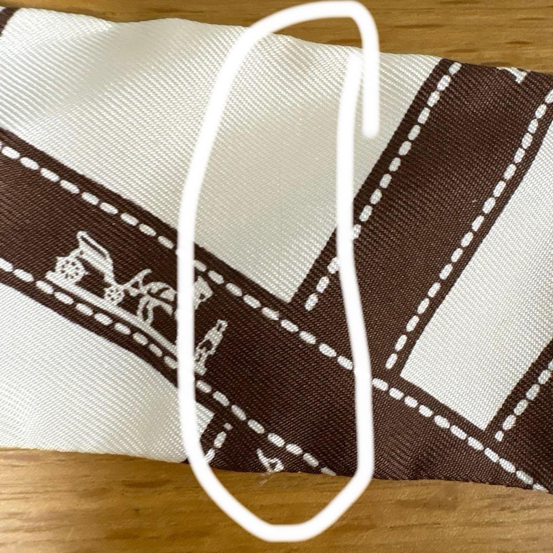 HERMES ツイリー ボルデュックリボン ホワイト ブラウン