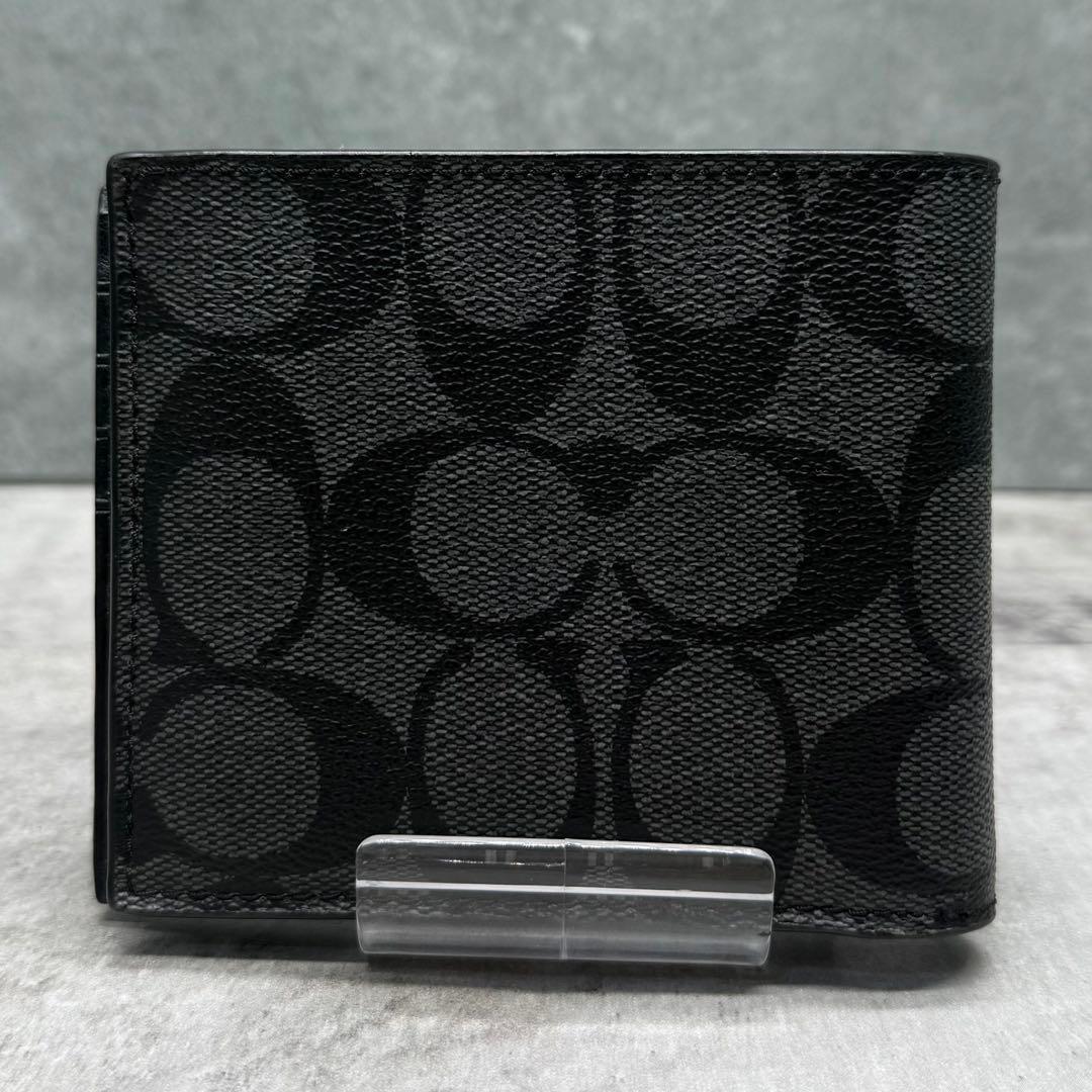 【美品】COACH コーチ 折り財布 PVC ブラック シグネチャー メンズ