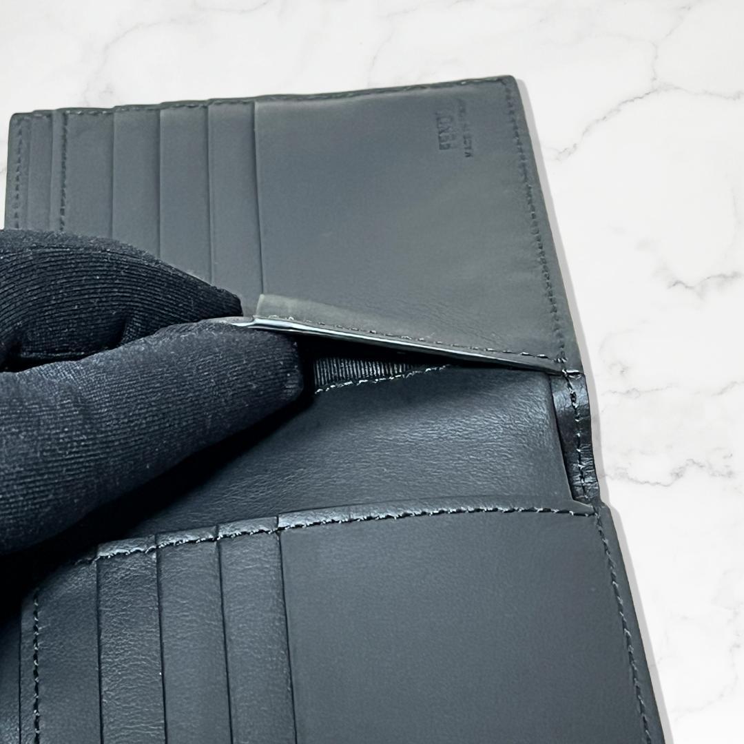 FENDI フェンディ 二つ折り財布 ブラック レザー モンスターアイ メンズ