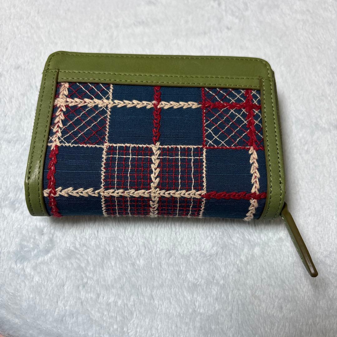 新品未使用　シビラ　sybilla クアドロス　二つ折り財布　グリーン