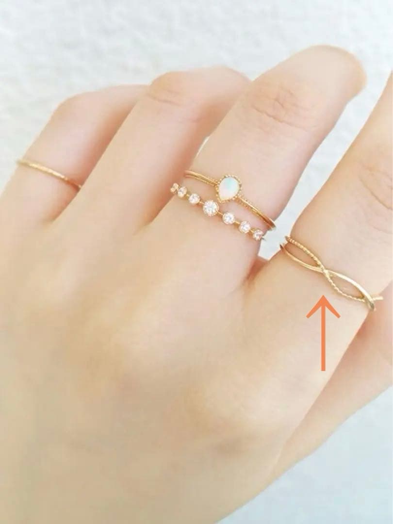 ノワールドプーぺ　K10 シンプルクロスラインレイヤードリング　9号