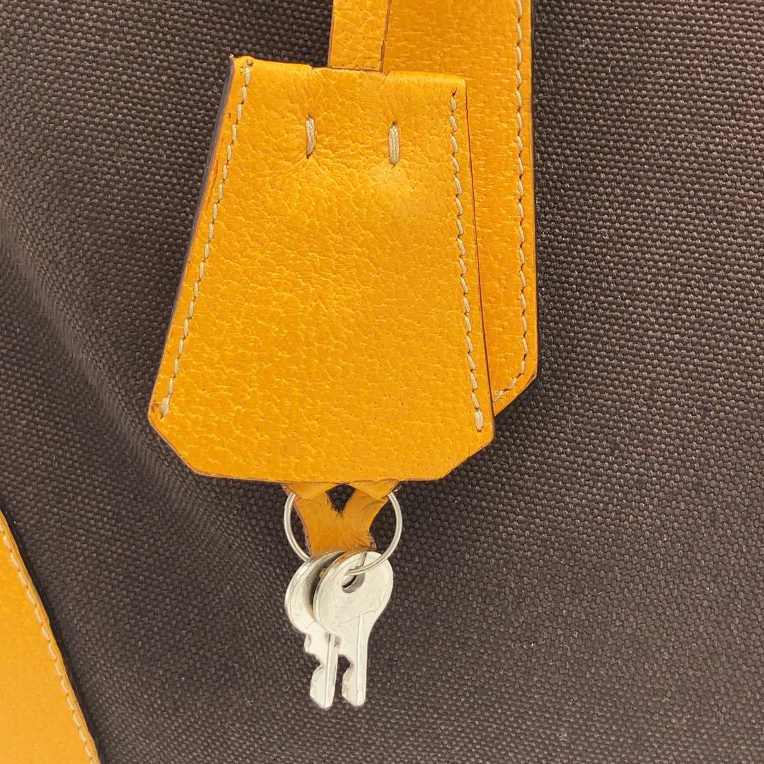 PRADA 三角ロゴプレート キャンバス レザー ミニボストン ハンドバッグ