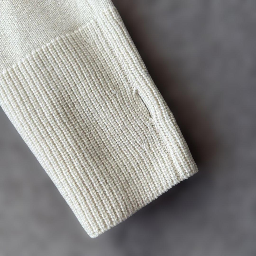 manufactured by WRAPINKNOT ニットトップス