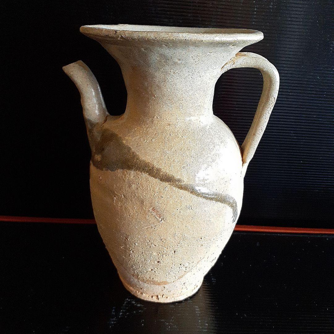 唐代長沙窯黄秞褐彩壺