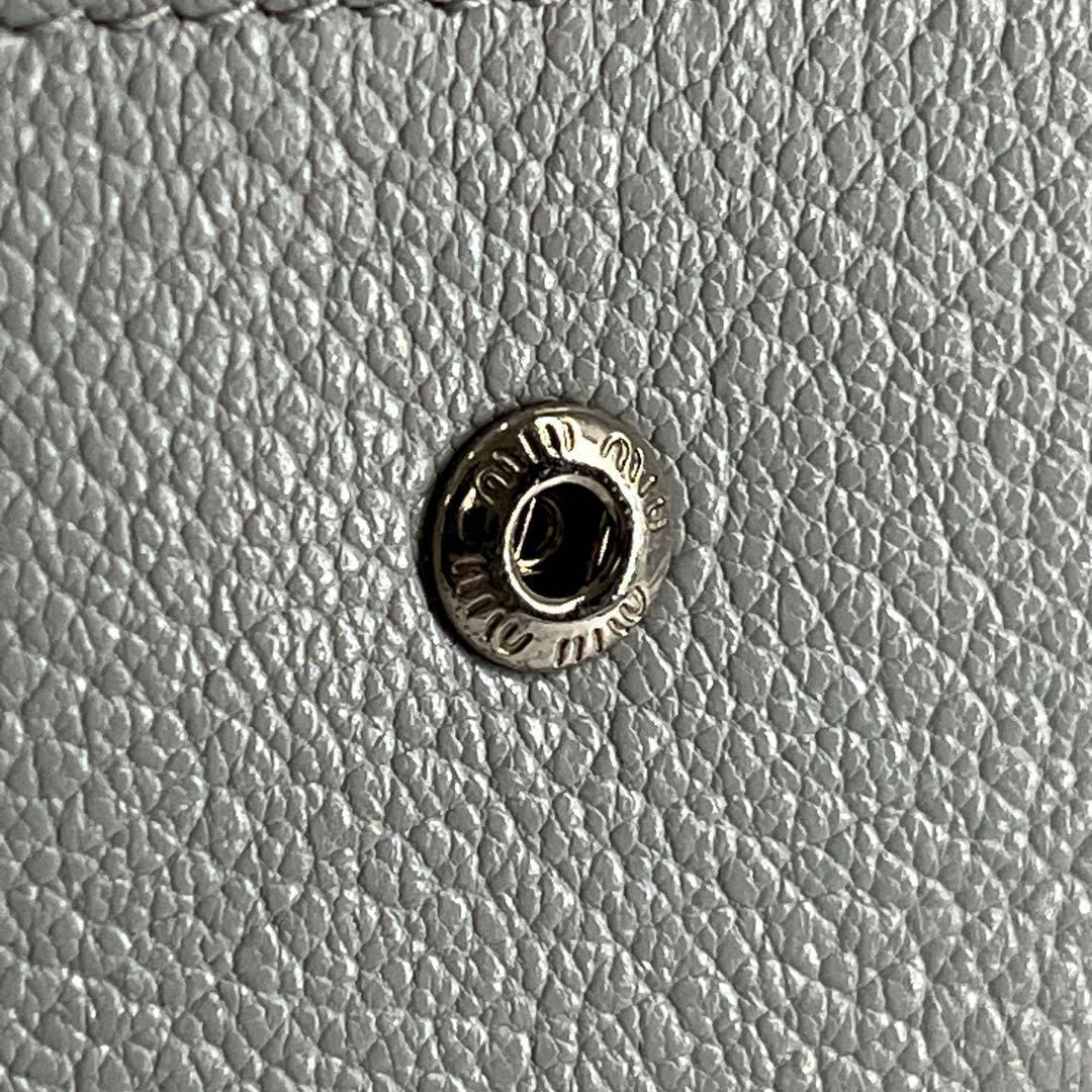 ミュウミュウ　折り財布　コンパクト財布　マドラス　パール　リボン　水色　レザー