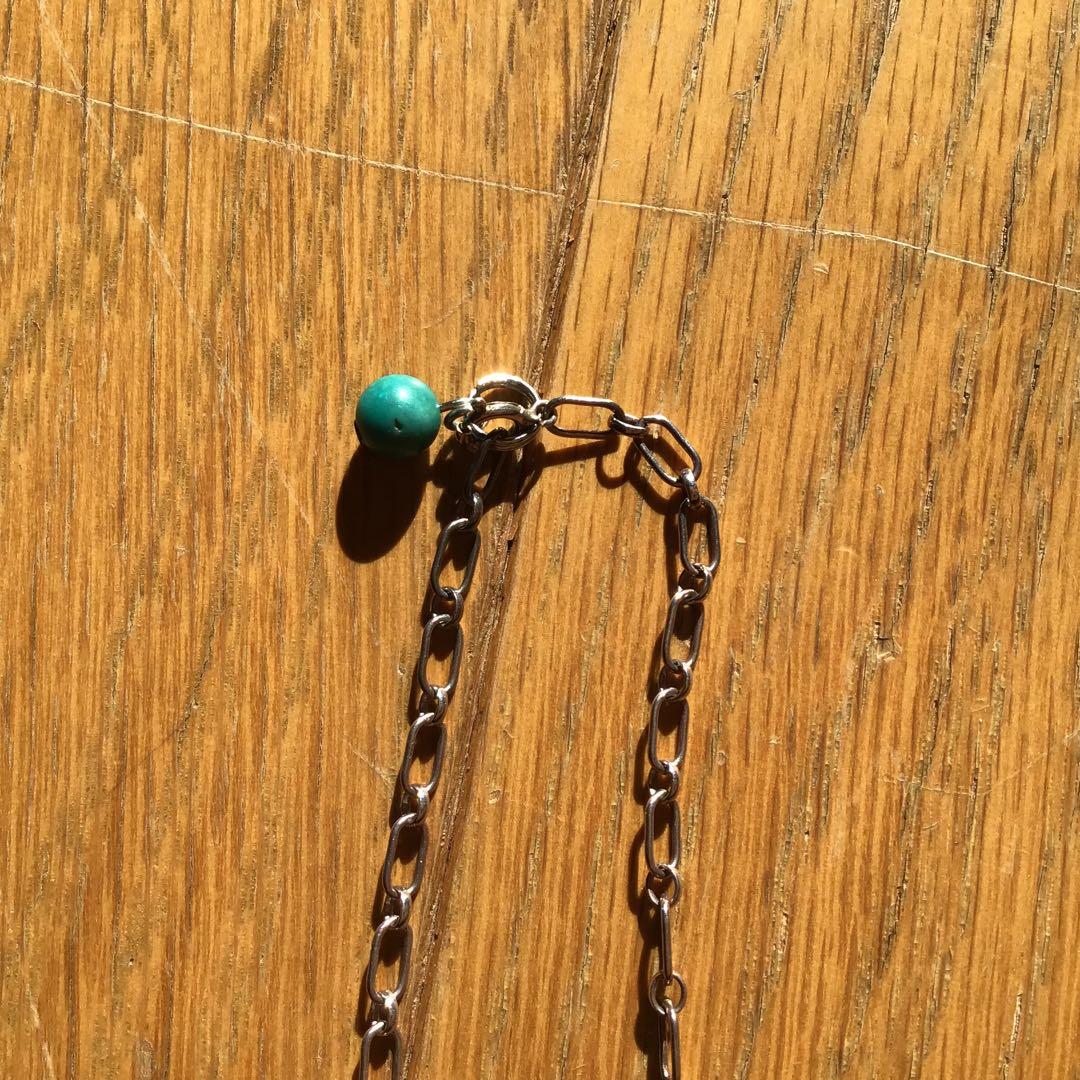 ターコイズ色の翼デザインネックレス