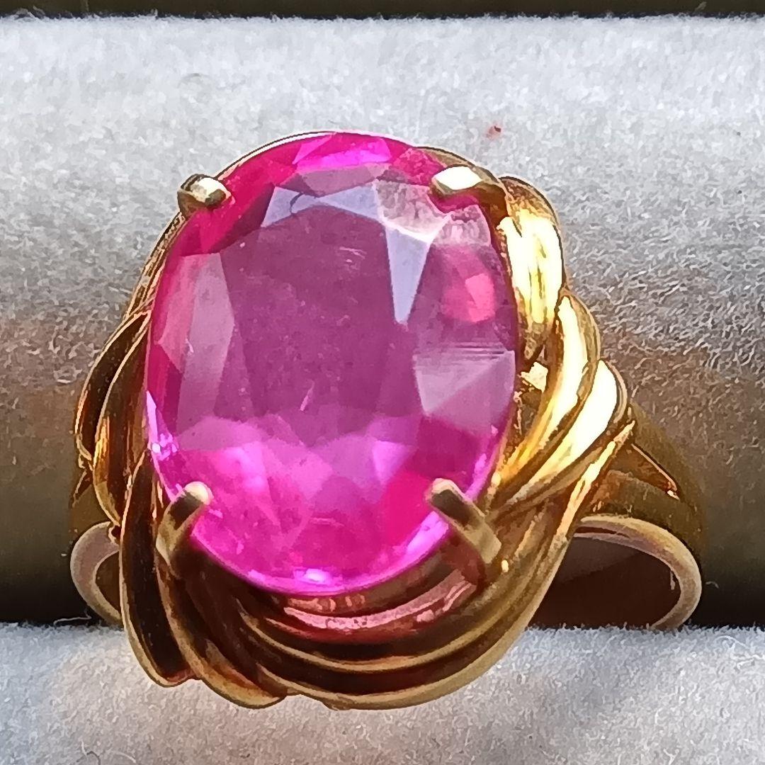 ピンク色おたからや聞くルビーかストーンリングK１８内径約１６mm重量合計４.５g