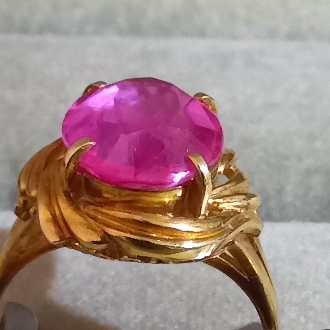 ピンク色おたからや聞くルビーかストーンリングK１８内径約１６mm重量合計４.５g