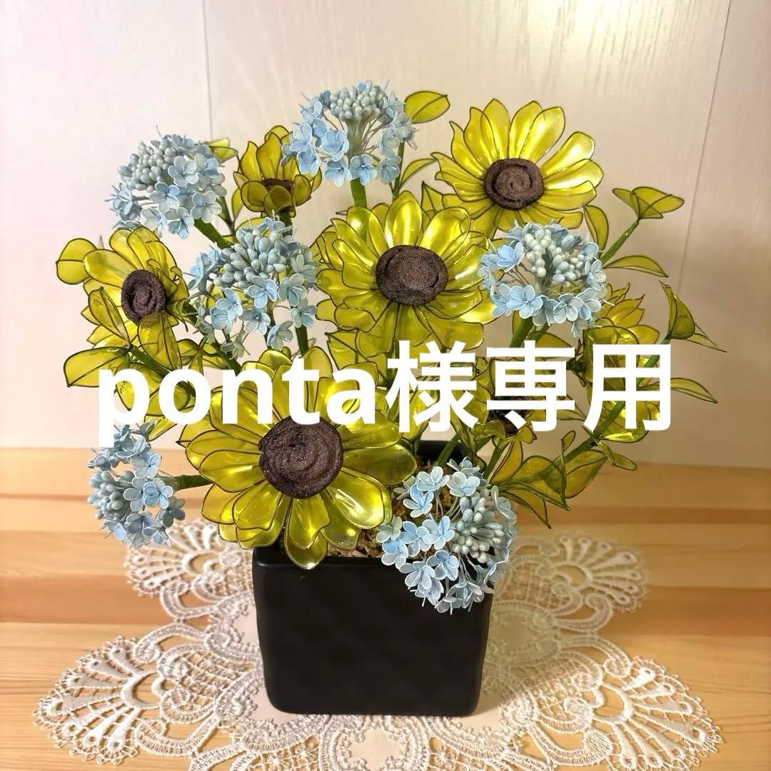 アメリカンフラワーのひまわりのアレンジ、モンステラ、ユッカ