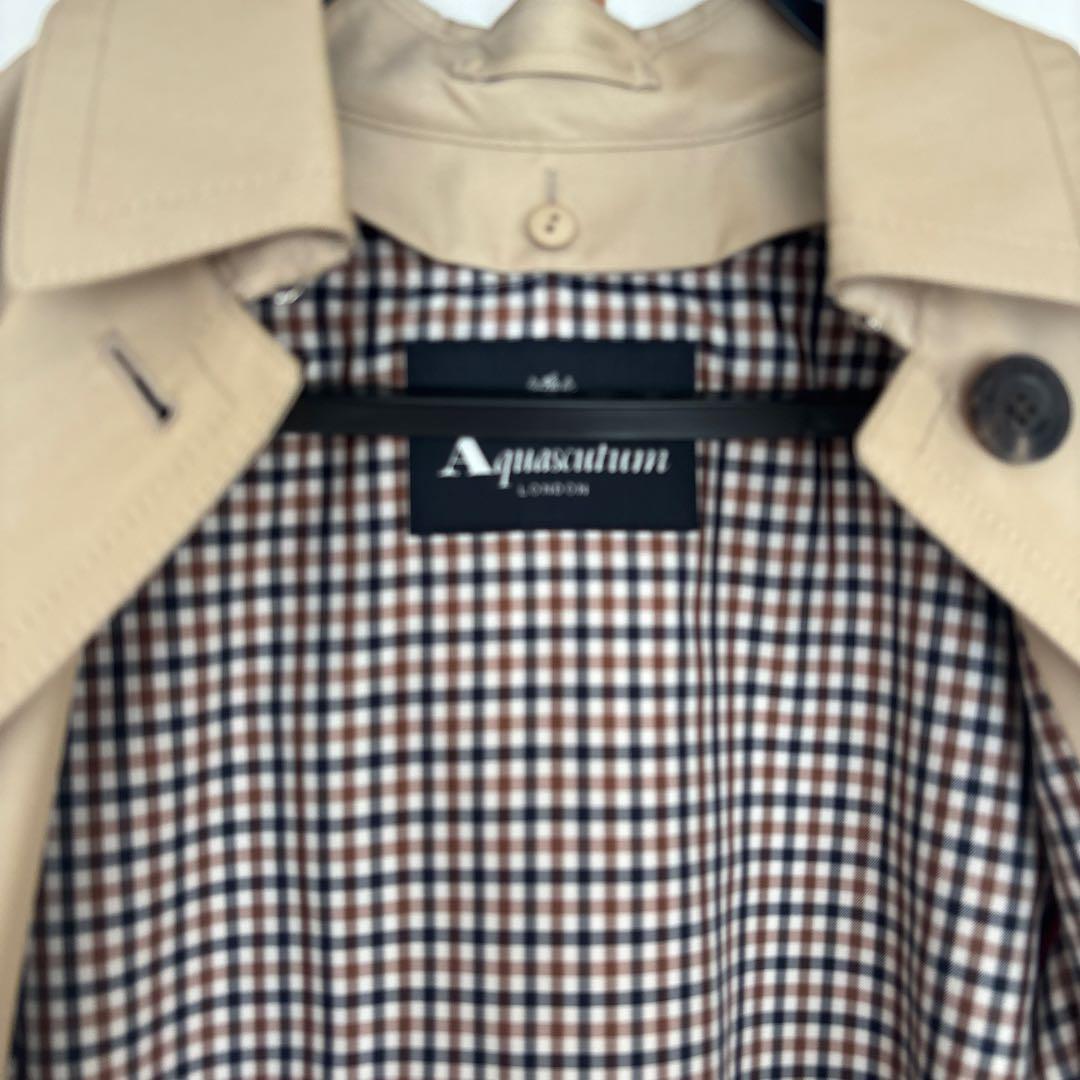 アクアスキュータム　トレンチコート