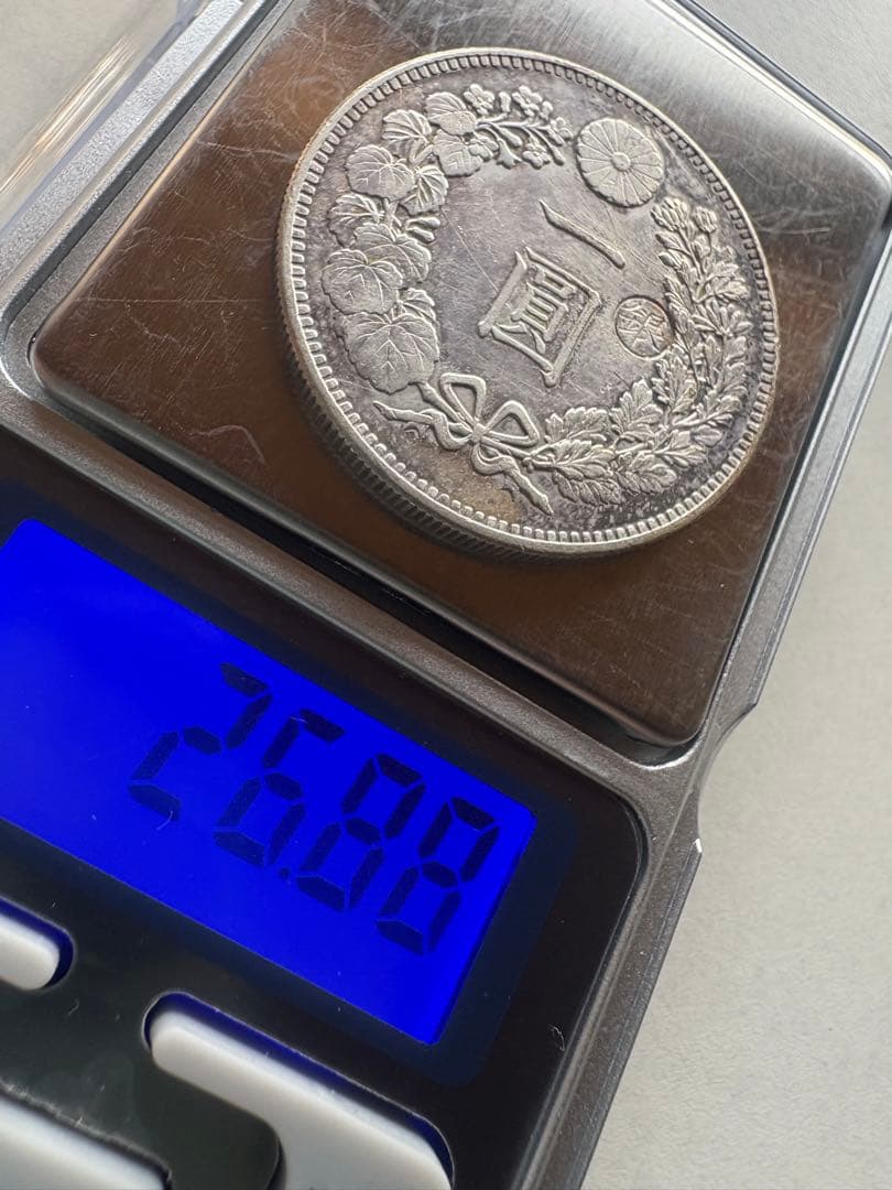 s*e様 【本物保証】　一圓銀貨　丸銀右打　明治28年銘