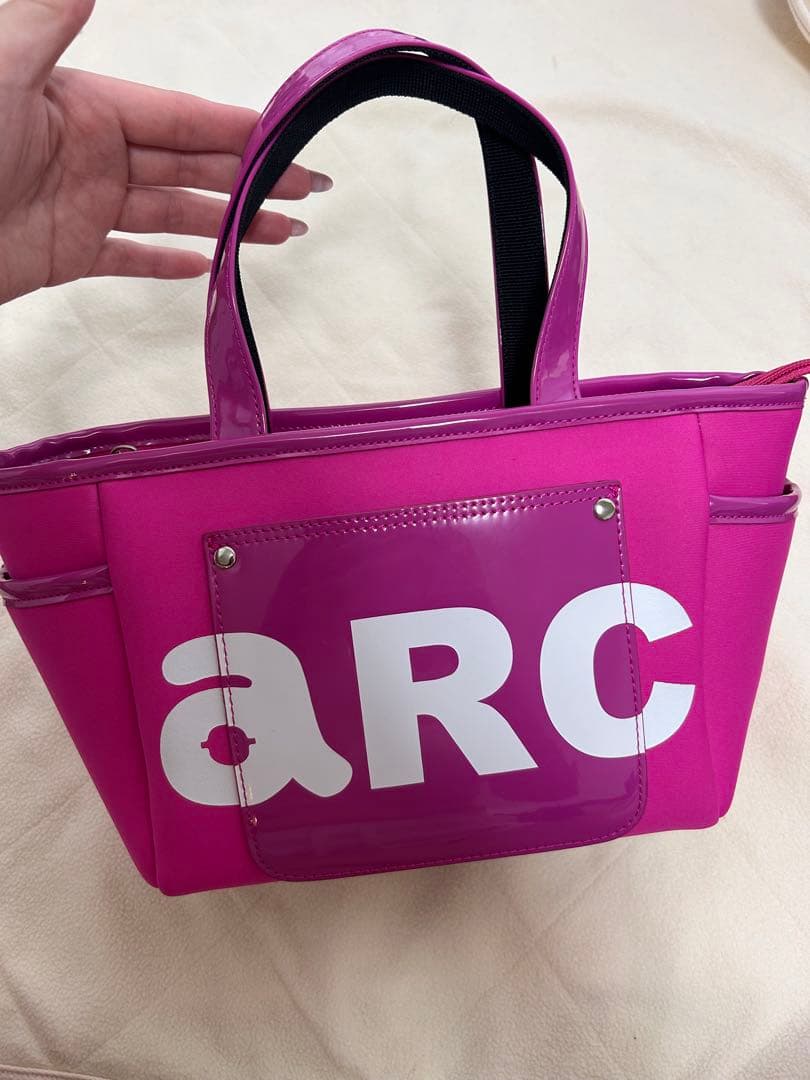 ピンク トートバッグ arc ロゴ入り アルチビオ