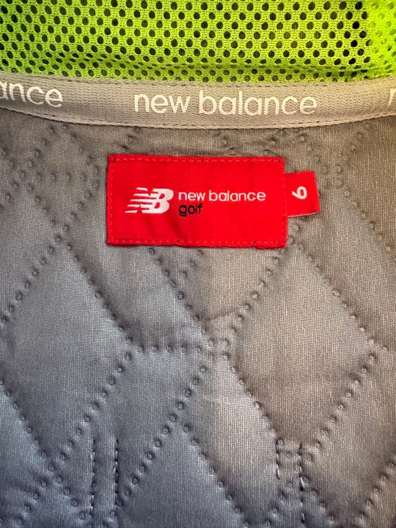 New Balance フード付きジャケット ブラック/グリーン