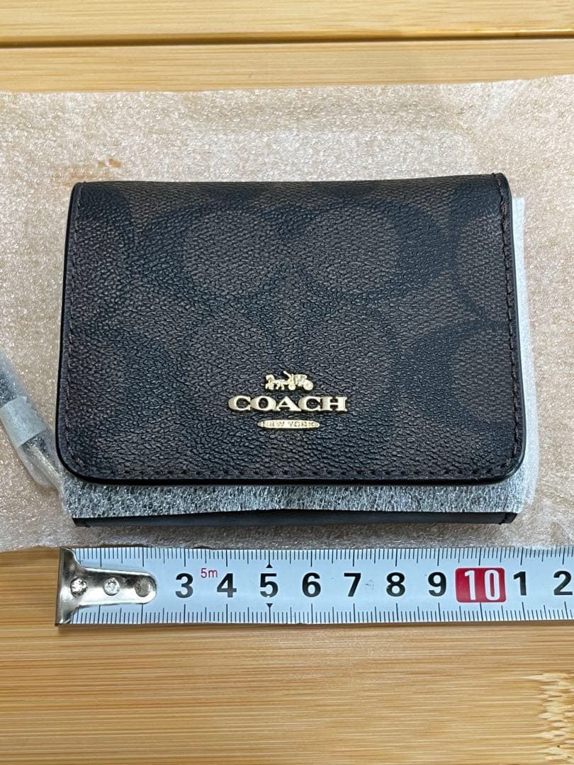 [新品未使用❤️】COACH（コーチ）折りたたみ財布／ケース付き