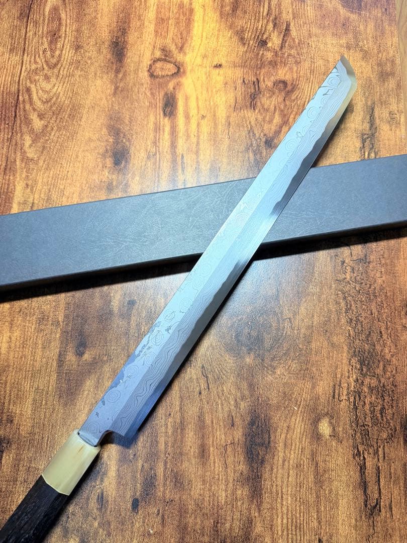 【堺打刃物】森本光一作　刺身 先丸　青ニ鋼 墨流し　　尺三寸　黒檀八角白水牛柄