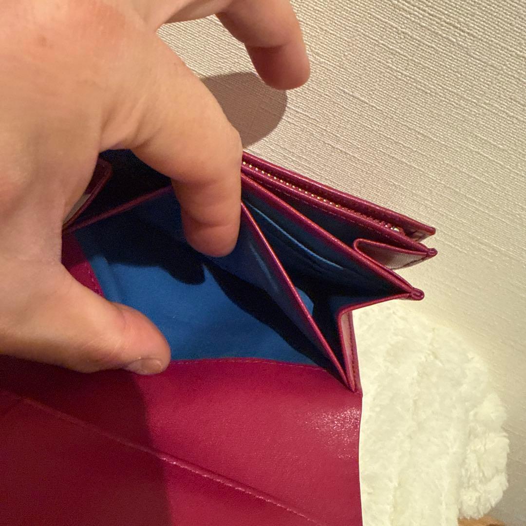 ホコモモラ 二つ折り 財布 牛革