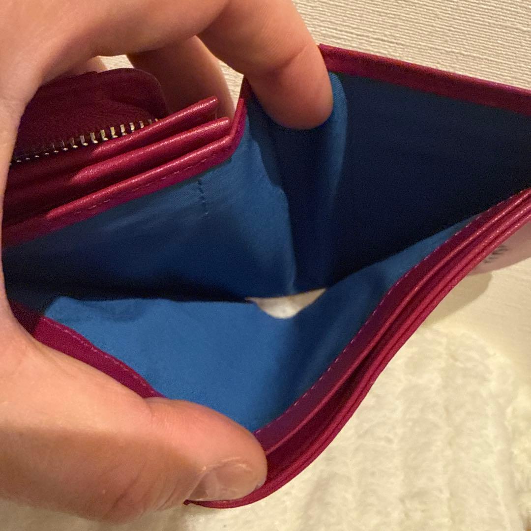 ホコモモラ 二つ折り 財布 牛革