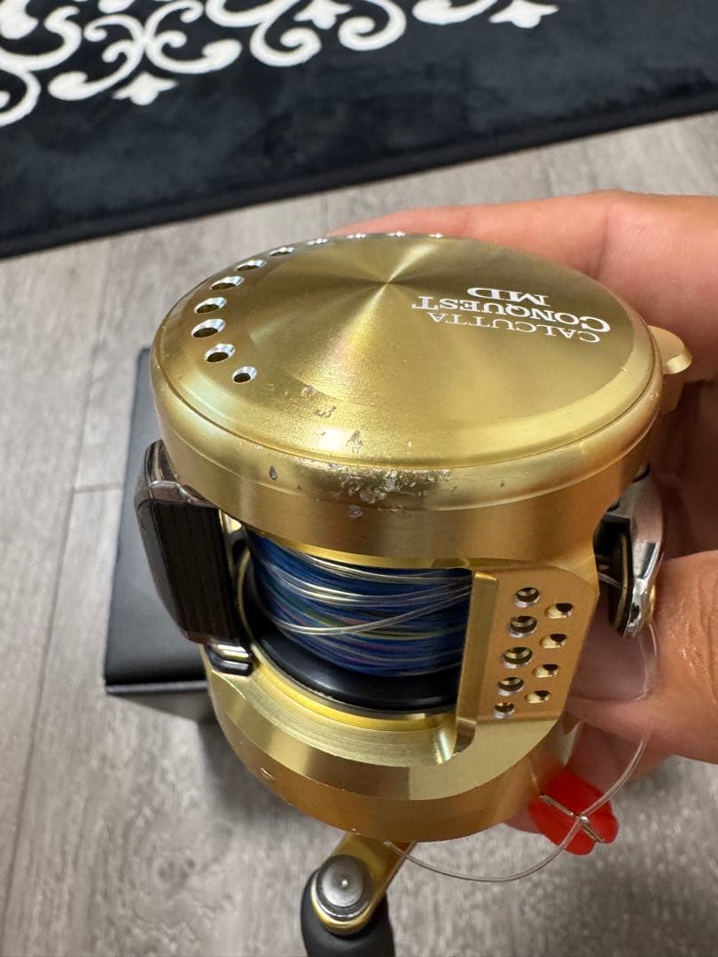SHIMANO 23カルカッタコンクエストMD300XG シングルハンドル付き