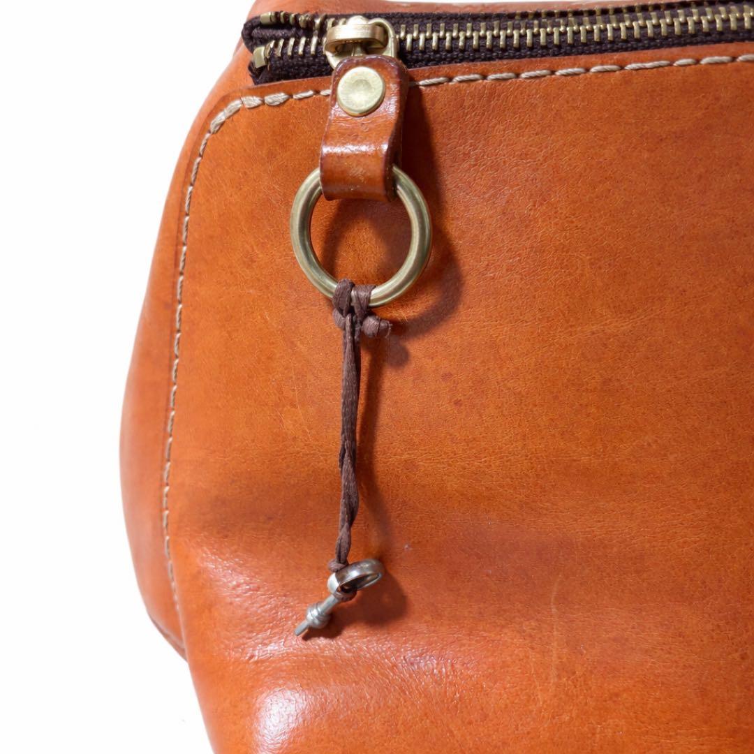 ヘルツ わんぱくリュック がま口 レザー バックパック ロック金具 鍵付き 茶