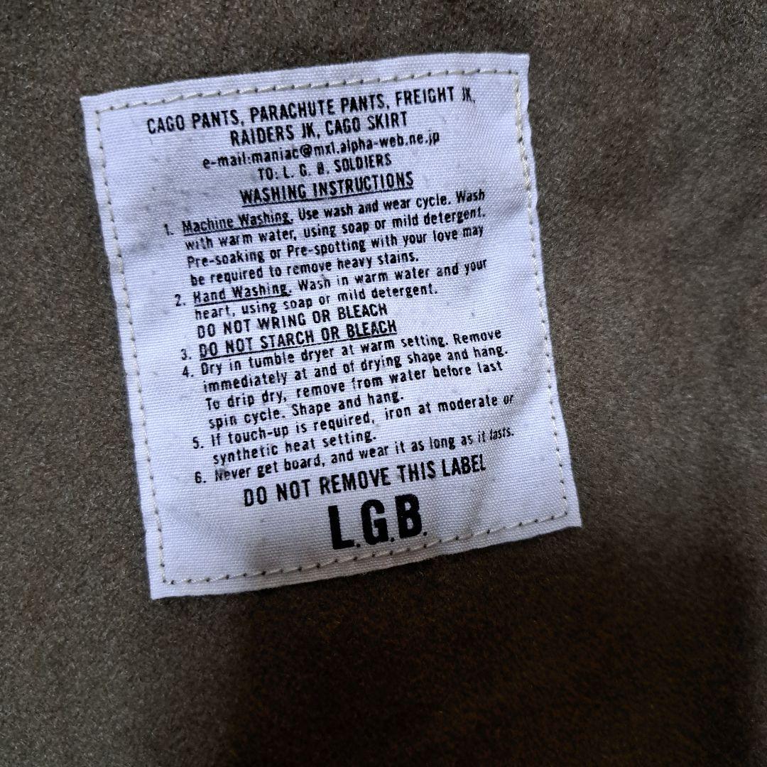 オリーブ色 ダブルブレスト トレンチコート