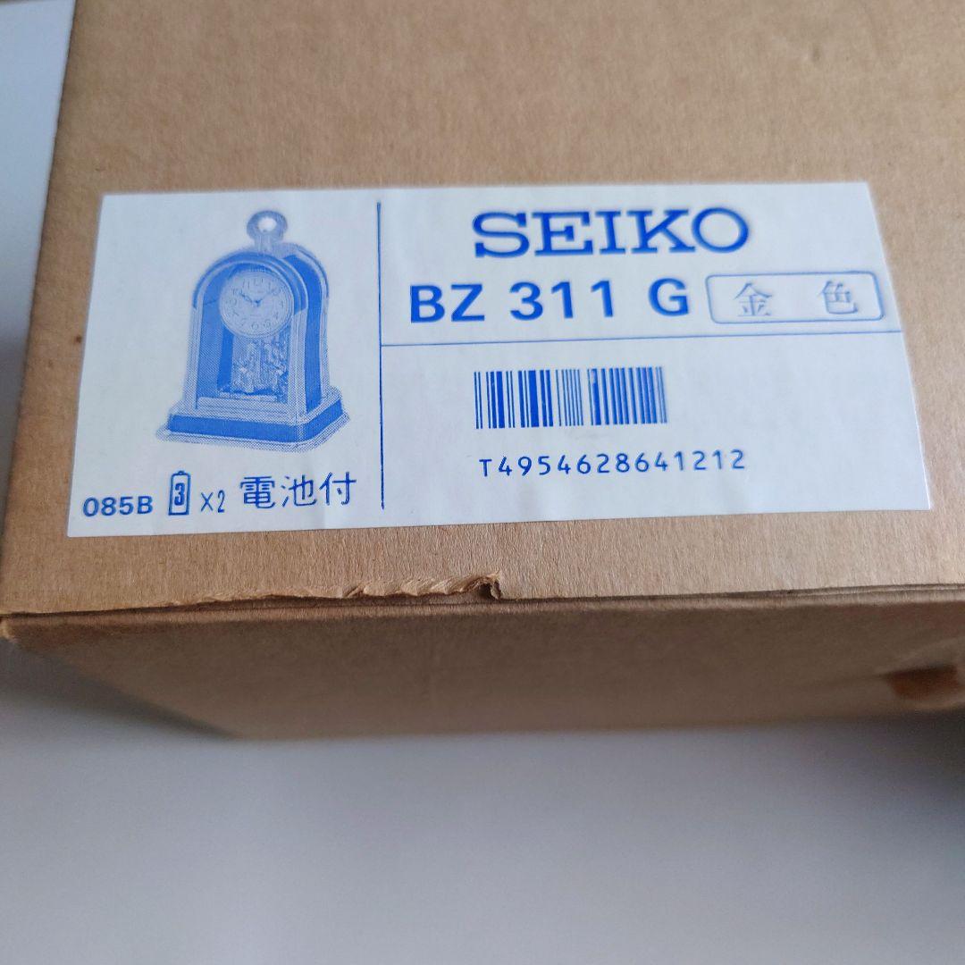 服部セイコー セイコークオーツクロック回転飾り付き 置き時計