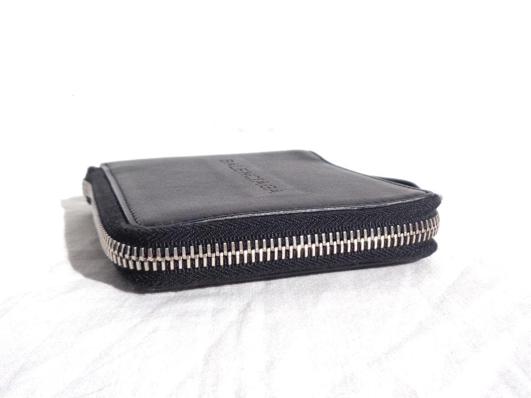 美品 BALENCIAGA パンチングロゴレザーラウンドジップ二つ折り財布 黒