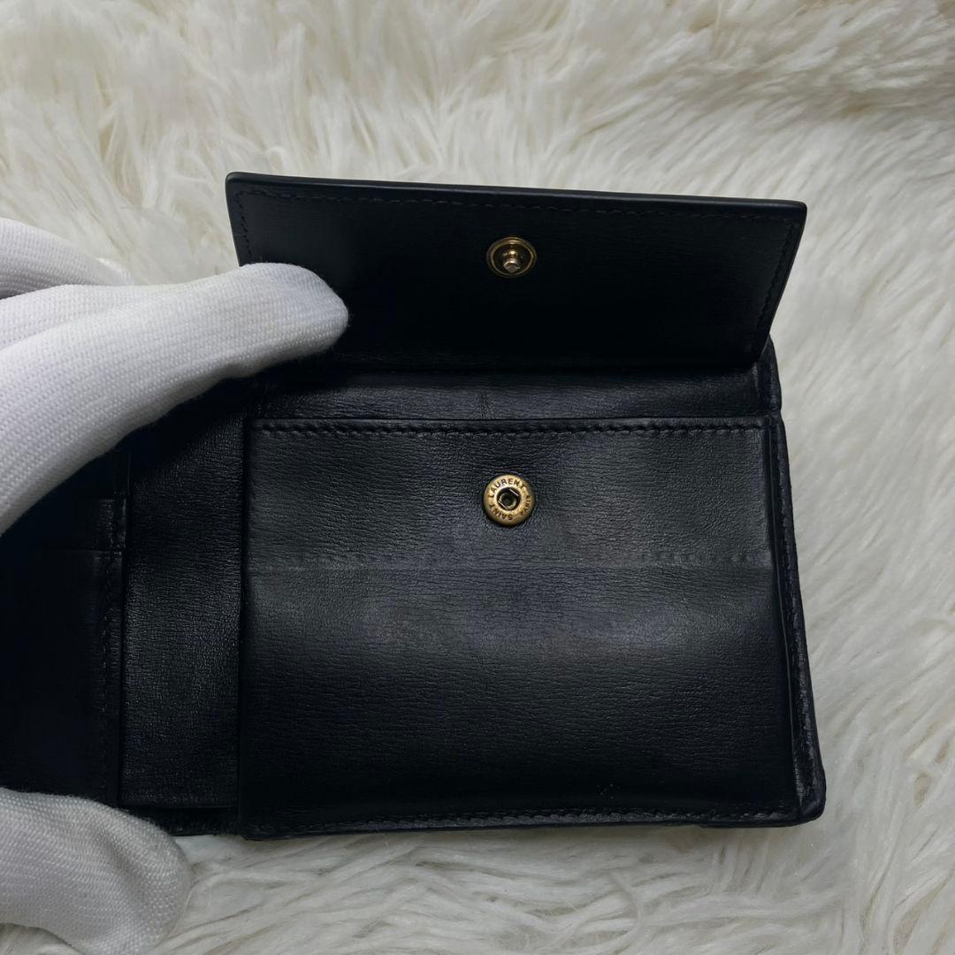 サンローラン 二つ折り財布 レザー カサンドラ 金具 ロゴ 黒 小銭入れ