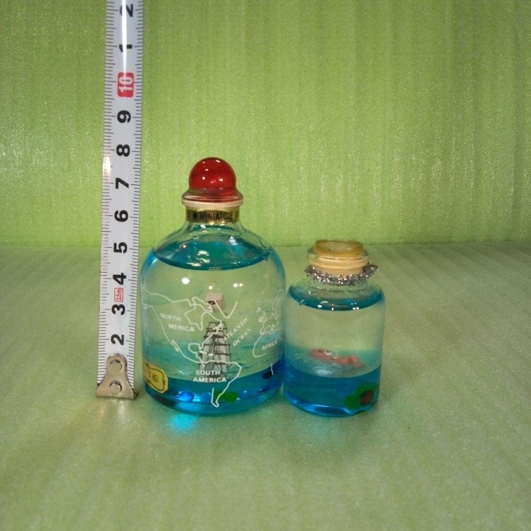 ①黒船　長崎オランダ村　ミニチュアボトル　②ラッコ　オイルドーム　①②セット