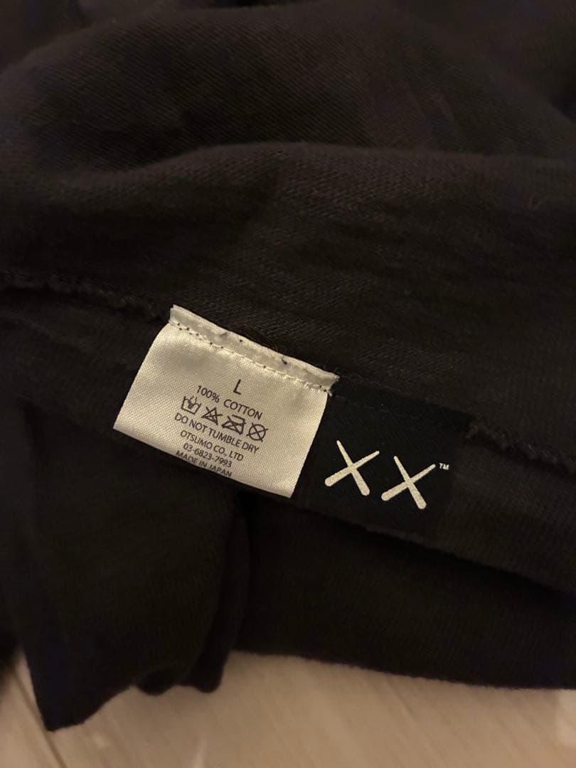 トップス KAWS humanmade