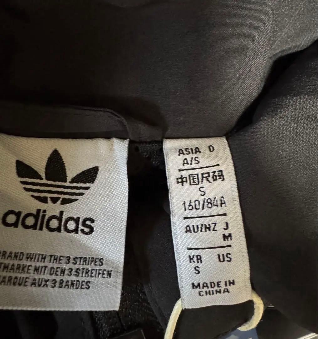 adidas ADILENIUMシーズン2オーバーサイズジップトラックトップ