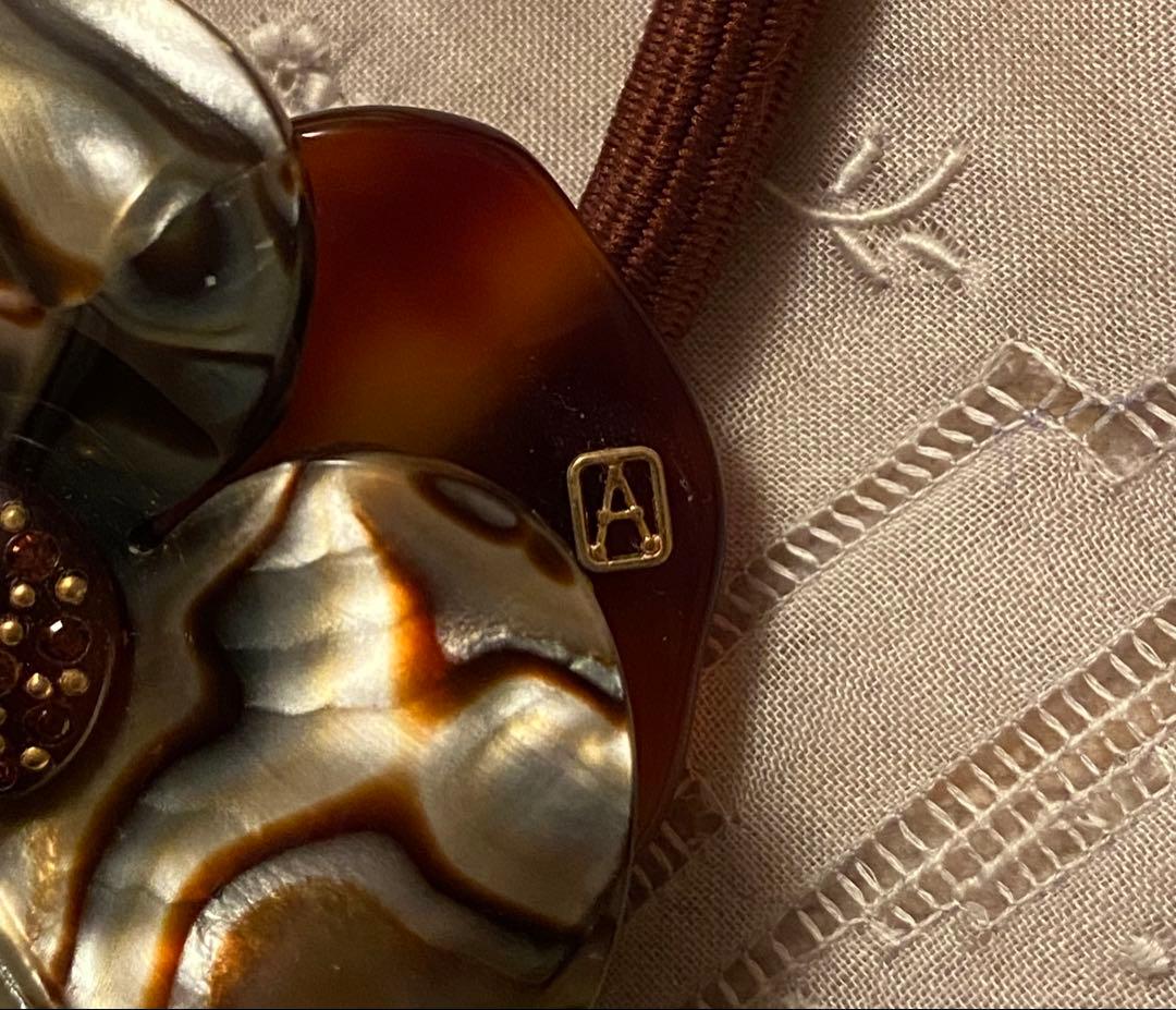 新品未使用ALEXANDRE DE PARIS☆マーブル模様の花モチーフヘアゴム