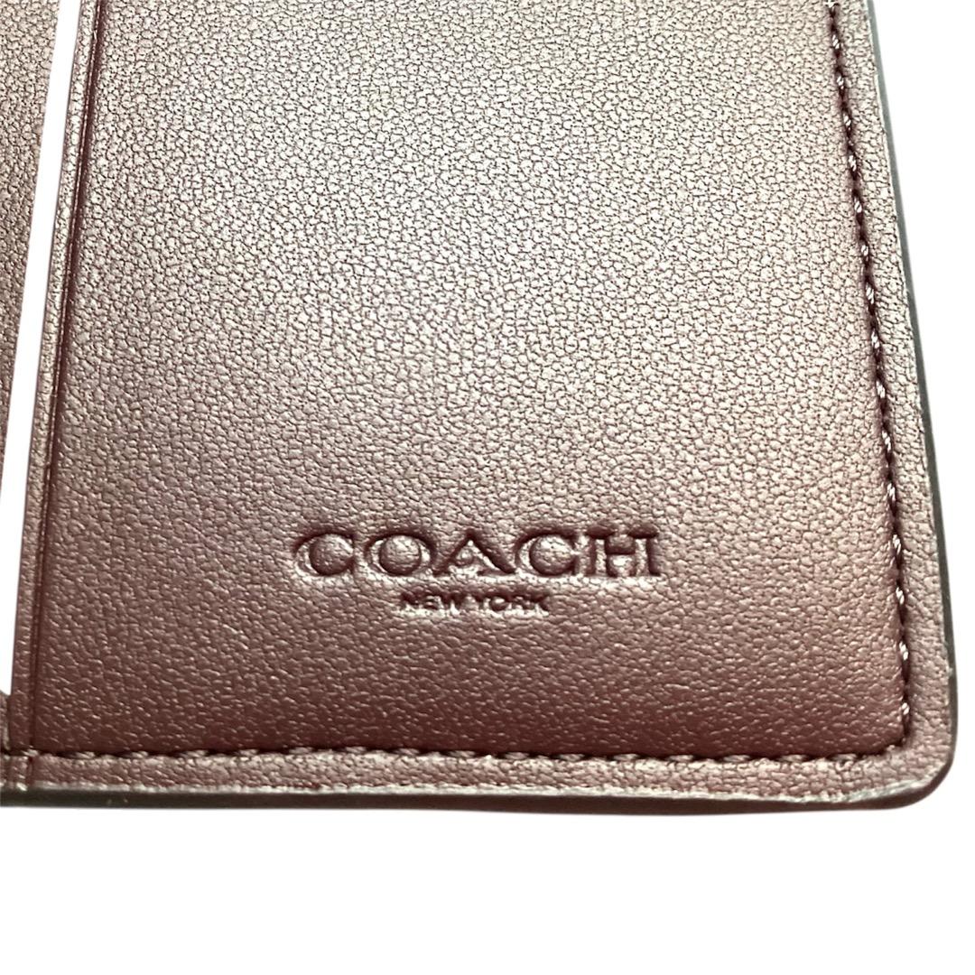 【新品/即発送】コーチ正規品　アメリカアウトレット　シグネチャー　二つ折り財布