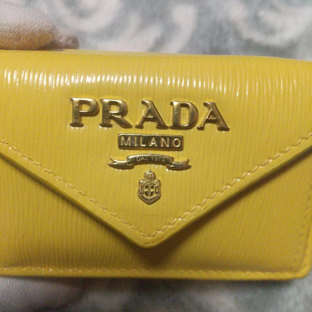 PRADA ヴェッテロムーブ　コンパクトウォレットイエロー 三つ折り財布