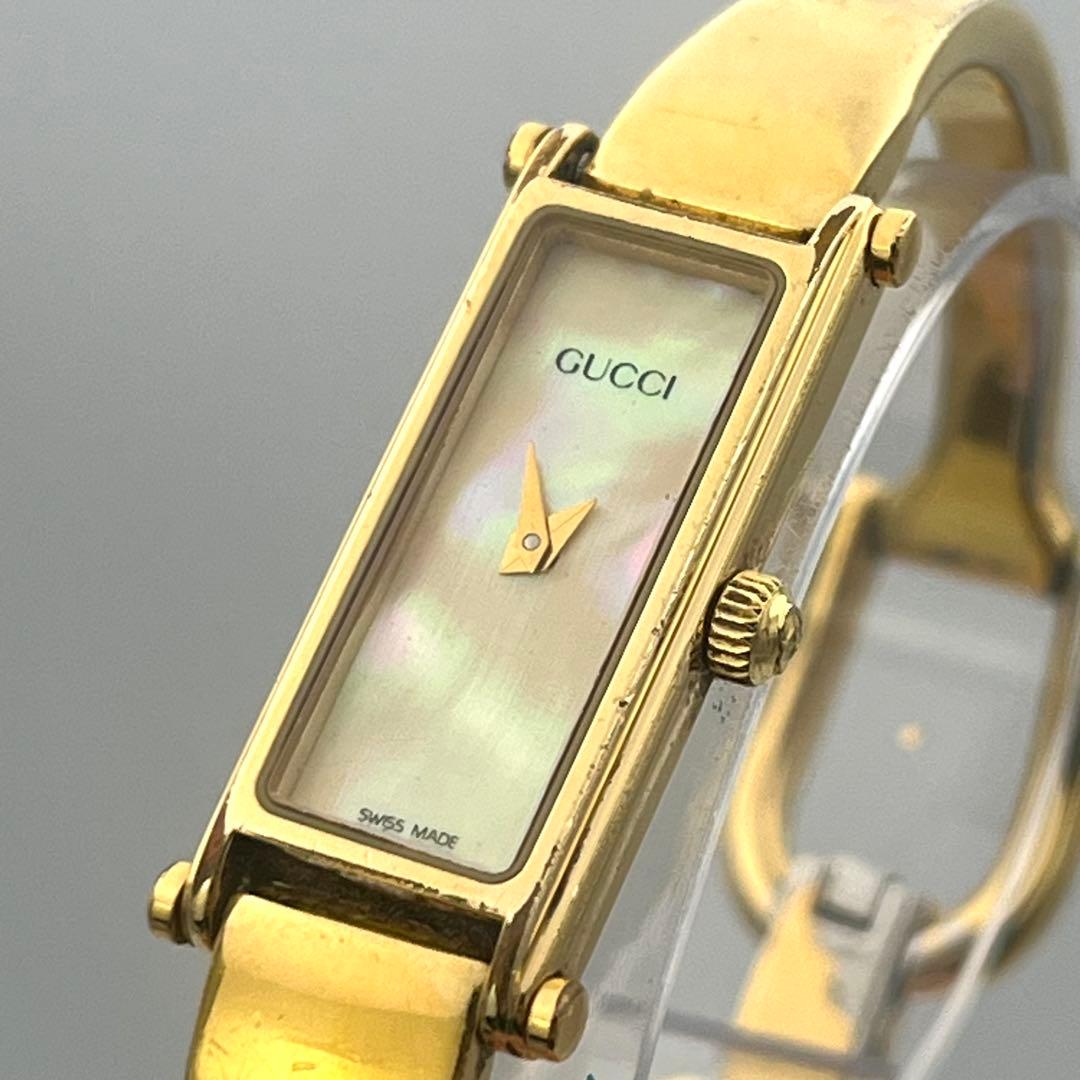 稼動 GUCCI シェル文字盤 1500L バングル ゴールド QZ 腕時計