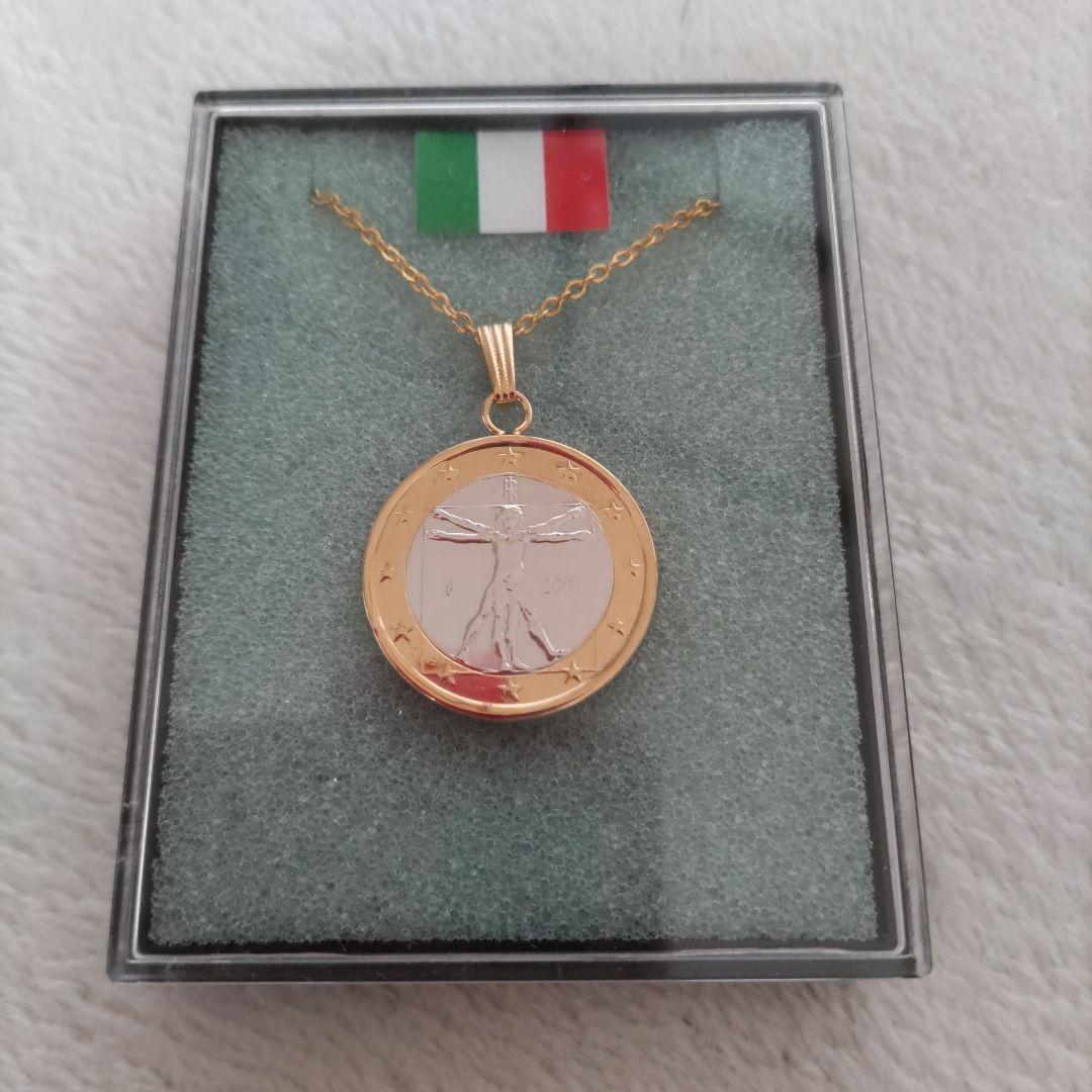 ペンダント。1ユーロ。ダ・ヴィンチデザイン